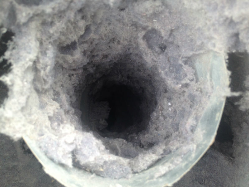 clogged dryer vent with lots of lint