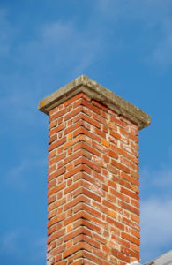 masonry chimney with blue sky